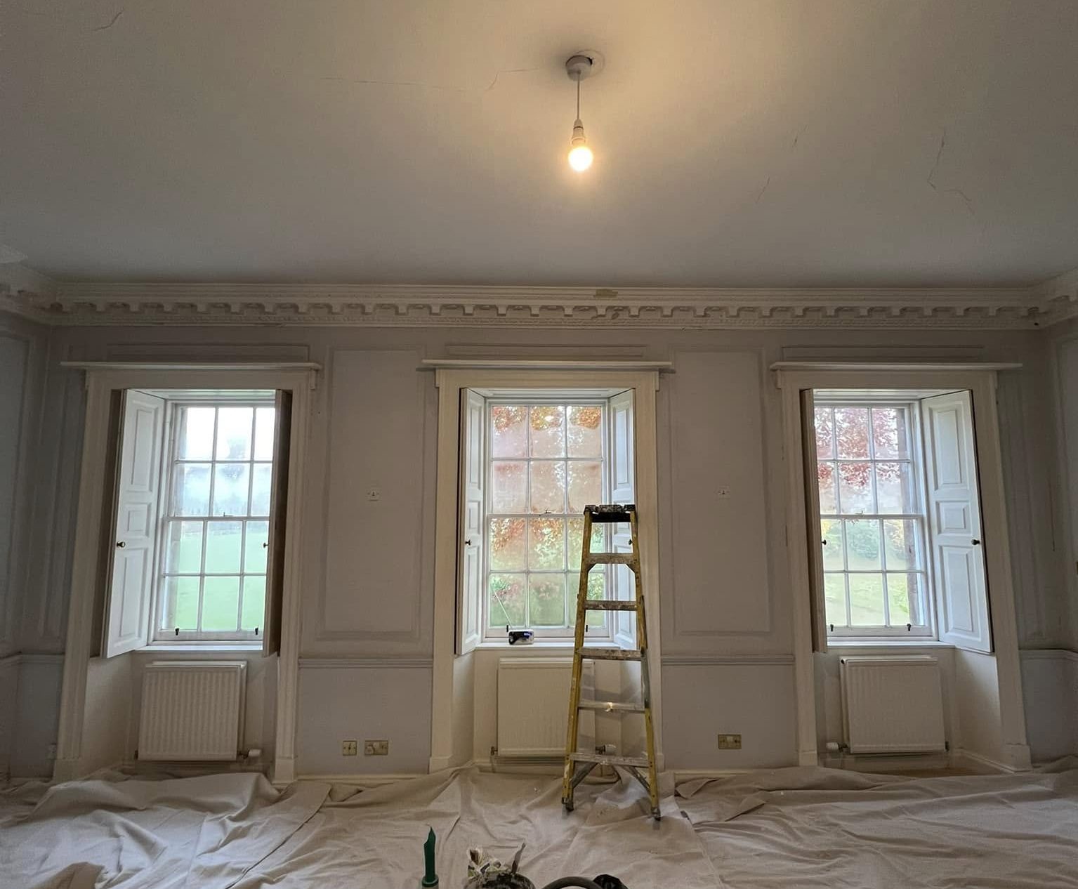 Before image of a window wall painting